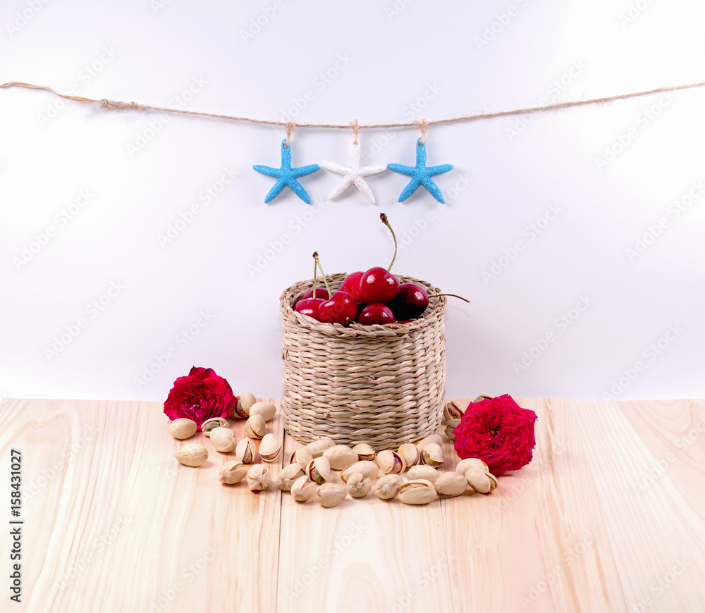 Cherries with flower and white background. Cherries with flower and white background.