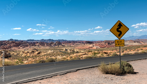 Curved Road Sign in Desert Panorama. Nevada, Valley Of Fire
