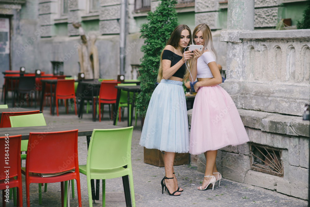 Naklejka premium girls in skirt