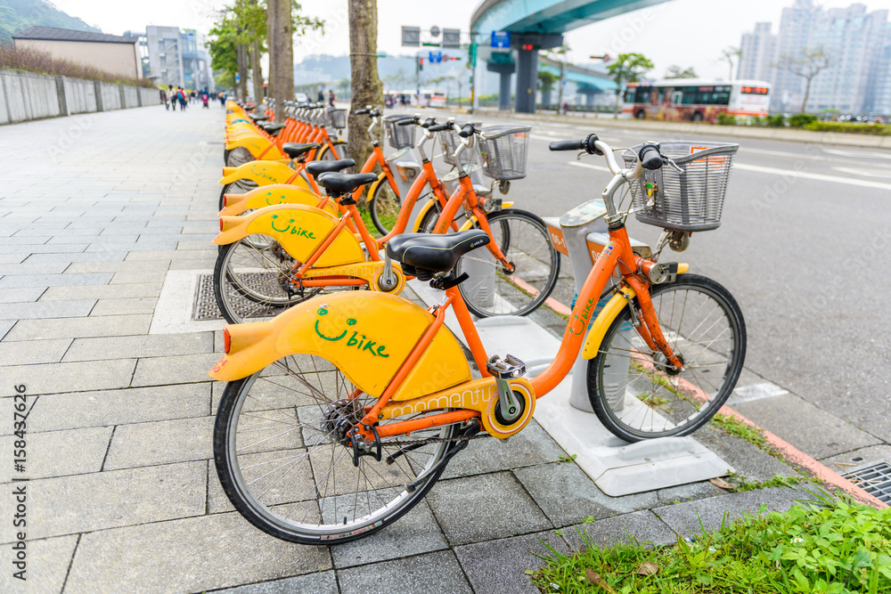 Row of Ubike. Ubike is a popular network of rental bicycle in Taipei, Taiwan. Ubike is a bike sharing system service used by citizens as short-distance transit vehicles.