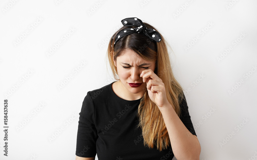 Sad crying disappointed funny business woman. Portrait of Caucasian stressed frustrated young woman looking unhappy. Negative human emotion facial expression reaction attitude Sad crying disappointed funny business woman. Portrait of Caucasian stressed frustrated young woman looking unhappy. Negative human emotion facial expression reaction attitude