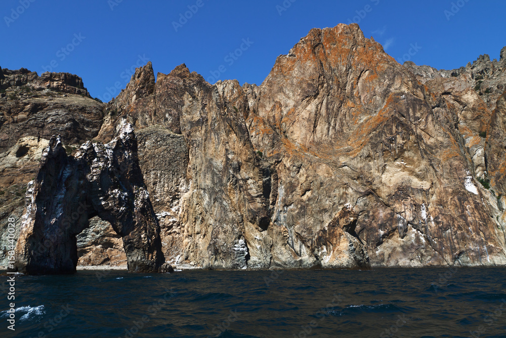 view of the rocky coast from the water view of the rocky coast from the water