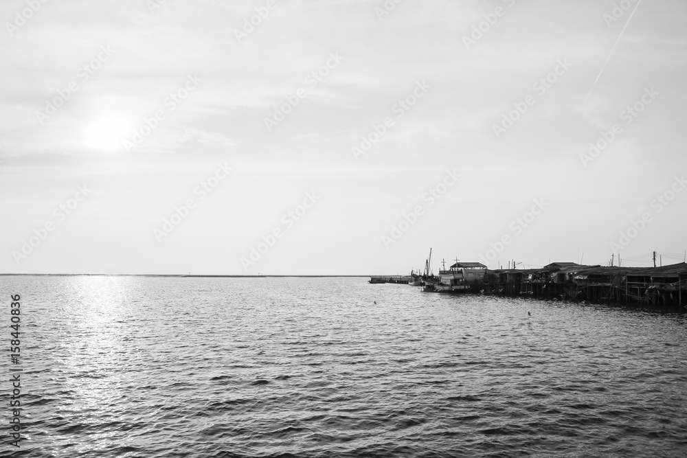 Fototapeta premium Wooden houses by the sea, Thailand