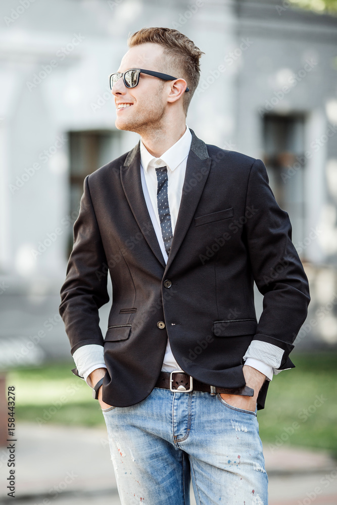 tylish handsome young man with bristle standing outdoors tylish handsome young man with bristle standing outdoors
