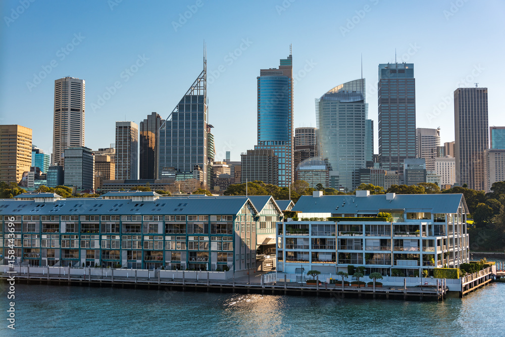 Fototapeta premium Historic Woolloomooloo wharf with Sydney CBD skyscrapers on the background