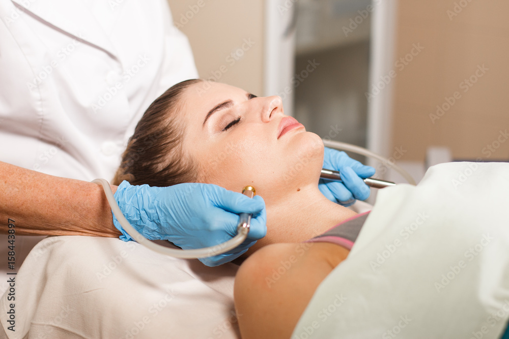 Conceptual beauty and cosmetology image of the hands of several beauticians holding their respective equipment. Beauty concept. Cosmetology concept. Cosmetology salon. Cosmetic procedures mesotherapy Conceptual beauty and cosmetology image of the hands of several beauticians holding their respective equipment. Beauty concept. Cosmetology concept. Cosmetology salon. Cosmetic procedures mesotherapy
