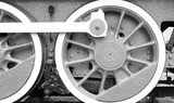 Black and white photo of details of the metal parts of vintage railway train