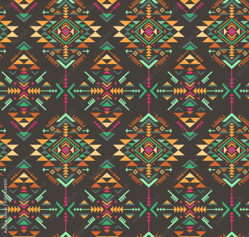 Colorful ethnic seamless pattern with geometric shapes.