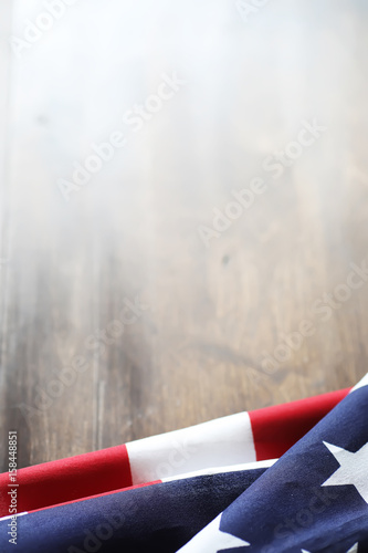 American flag on a wooden texture table