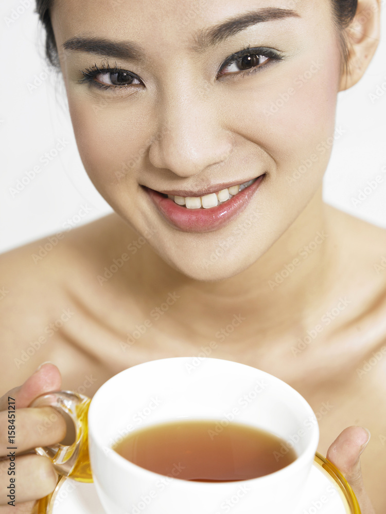 Close up shot of a girl having tea break Close up shot of a girl having tea break