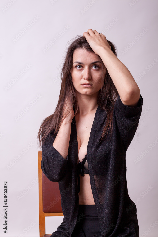Sexy busty lady posing in fashion style on gray background. Sexy lady.  Perfect beautiful attractive female posing in model test in studio Stock  Photo | Adobe Stock