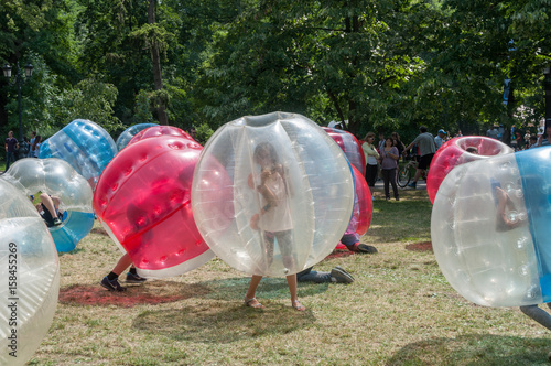 Teenagers play in Bubble bump