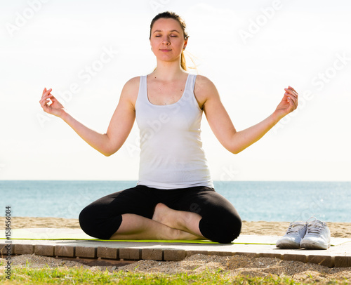 Woman doing yoga cross-legged