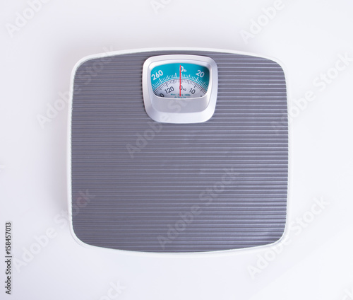 Konstfotografi weighing machine or Retro style weighing machine on background.