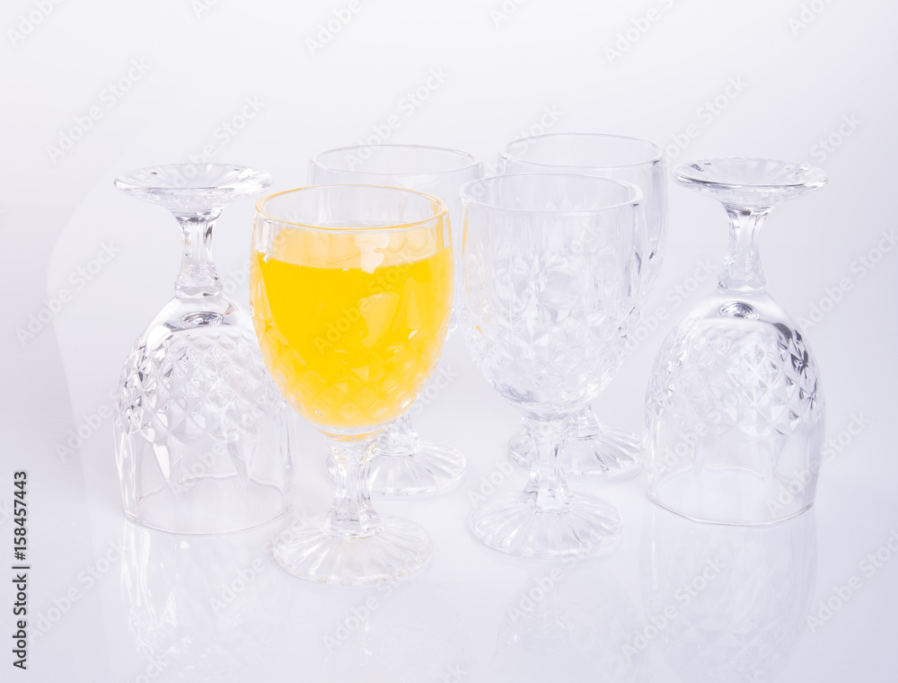 Orange juice in glasses on white background. Orange juice in glasses on white background.