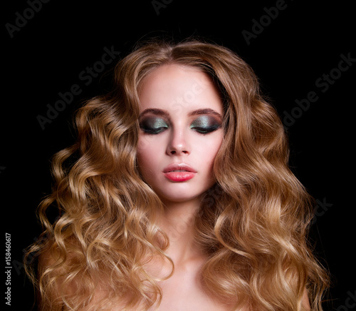 Beauty Fashion Model Woman , portrait, hairstyle with creative hair-dress, curls waves. Concept Girl face with perfect skin in dark Background