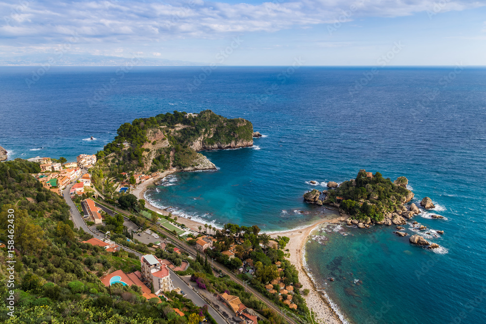 Taormina, Sicily - Beautiful landscape view of Mazzaró and Isola Bella Sicilian island of the mediterranean with beach and turquoise sea water