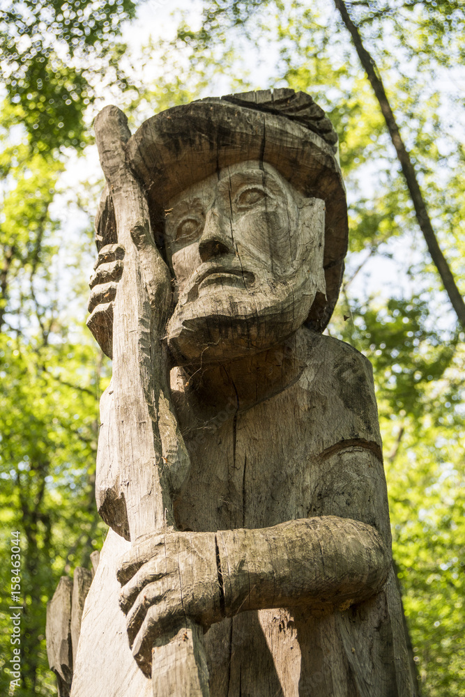 Wood sculpture in the woods