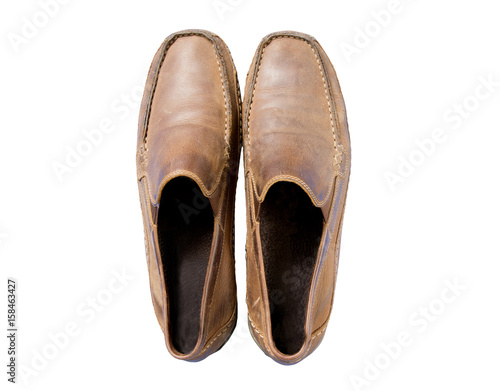male brown old leather shoes isolated on a white, top view