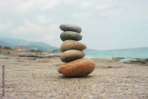 pyramid of stones on the beach