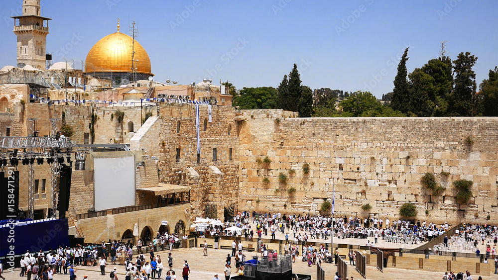 Western Wall or Wailing Wall or Kotel in Jerusalem timelapse. Plenty of people come to pray to the Jerusalem western wall. The Wall is the most sacred place for all jews on the planet.