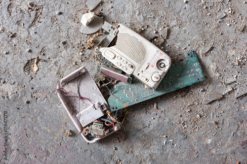 Destroyed radio receiver in abandoned industrial building