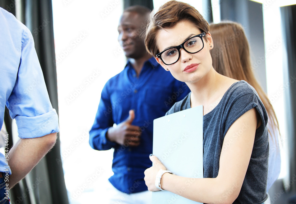 Modern business woman in the office with copy space. Modern business woman in the office with copy space.