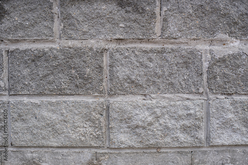 Grey brick wall texture background.