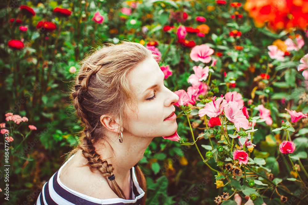 Woman in the summer garden Woman in the summer garden