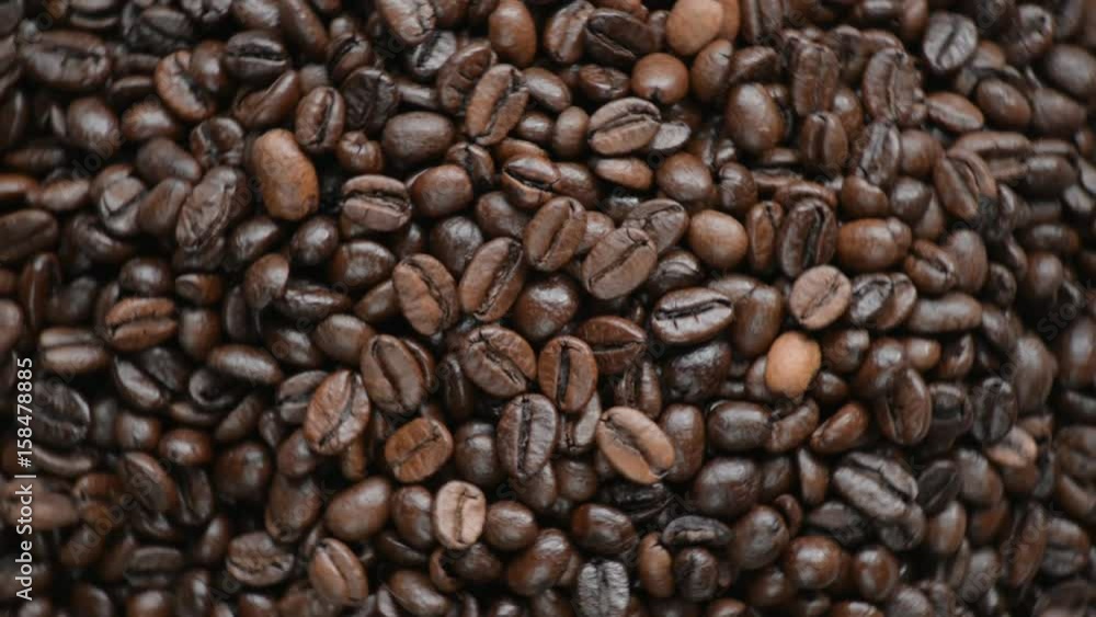 The coffee beans rotates on the turntable. The coffee beans rotates on the turntable.