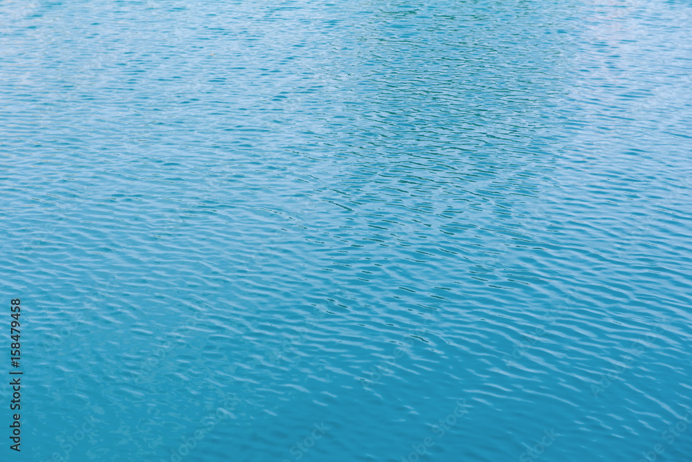 blue swimming pool with sunny reflections abstract for background blue swimming pool with sunny reflections abstract for background