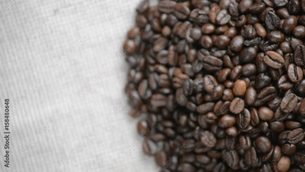 The coffee beans rotates on the turntable. The coffee beans rotates on the turntable.