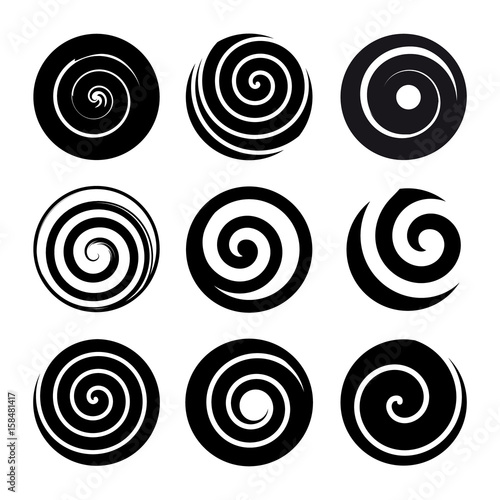 Set of spiral motion elements. Black isolated objects, different brush textures, vector illustrations.