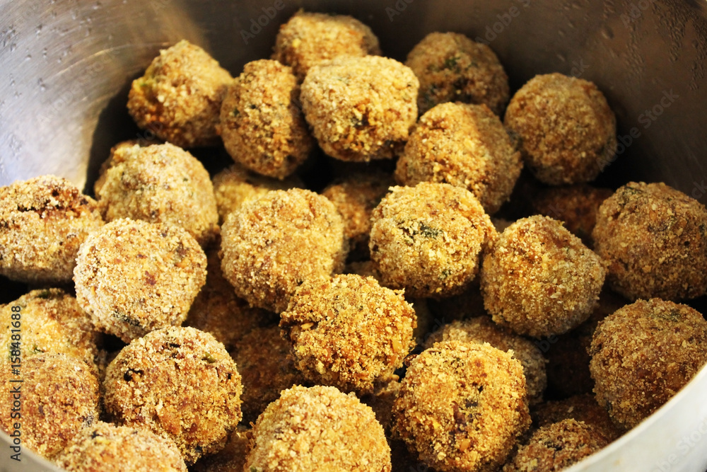 Falafel - a dish of deep-fried balls from chopped chickpeas, with the addition of beans, seasoned with spices Falafel - a dish of deep-fried balls from chopped chickpeas, with the addition of beans, seasoned with spices