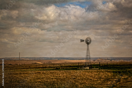 Windmill in the Flint Hills of Kansas  photo