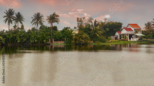 Houses along the Thu Bon river near Hoi An, Vietnam.