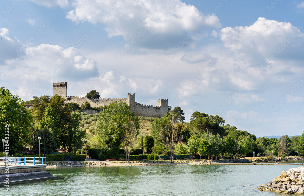 Trasimeno lake and medieval fortress in Castiglione del lago, italy