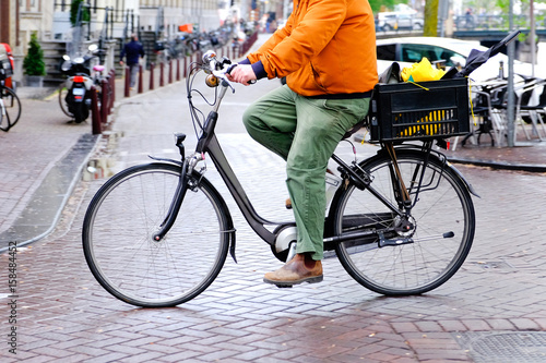 lower half of cyclist in amsterdam cycling