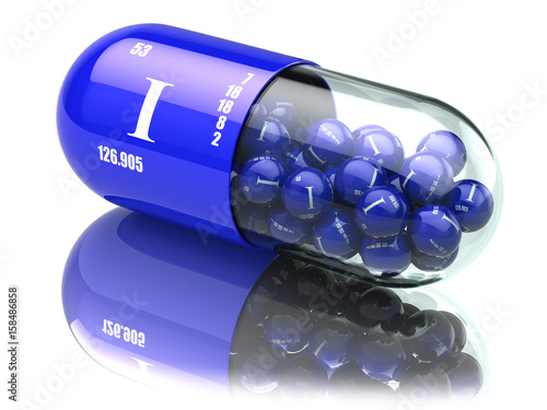 Fotografie Iodine I element pills. Dietary supplements. Vitamin capsules.