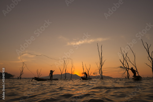 Wallpaper Mural Silhouette Fisherman in action fishing . Torontodigital.ca