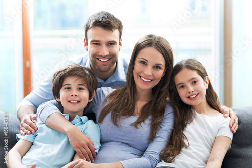 Family relaxing on sofa 