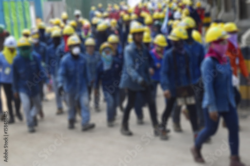 Blurred construction worker in construction site . Safety construction concept .