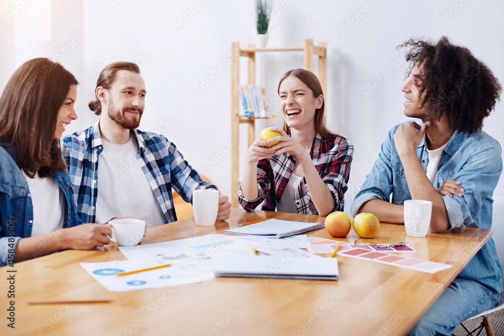 Lively passionate witty people enjoying a group chat Lively passionate witty people enjoying a group chat