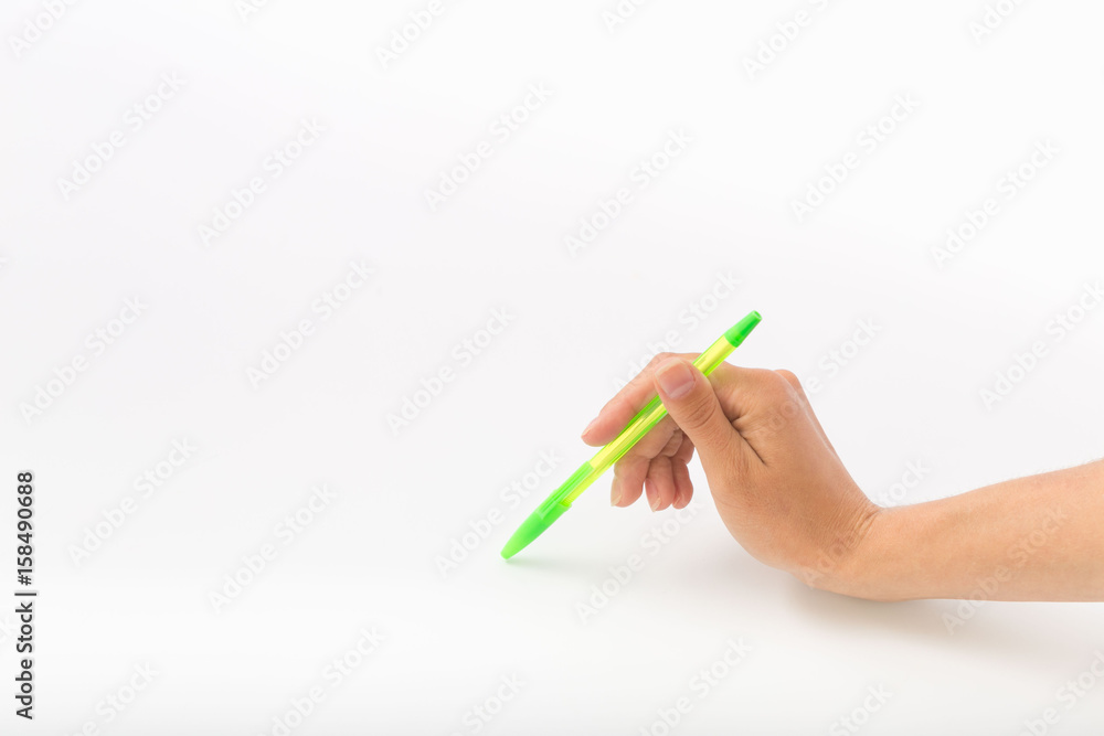 Naklejka premium Female hands on a white background with a pen