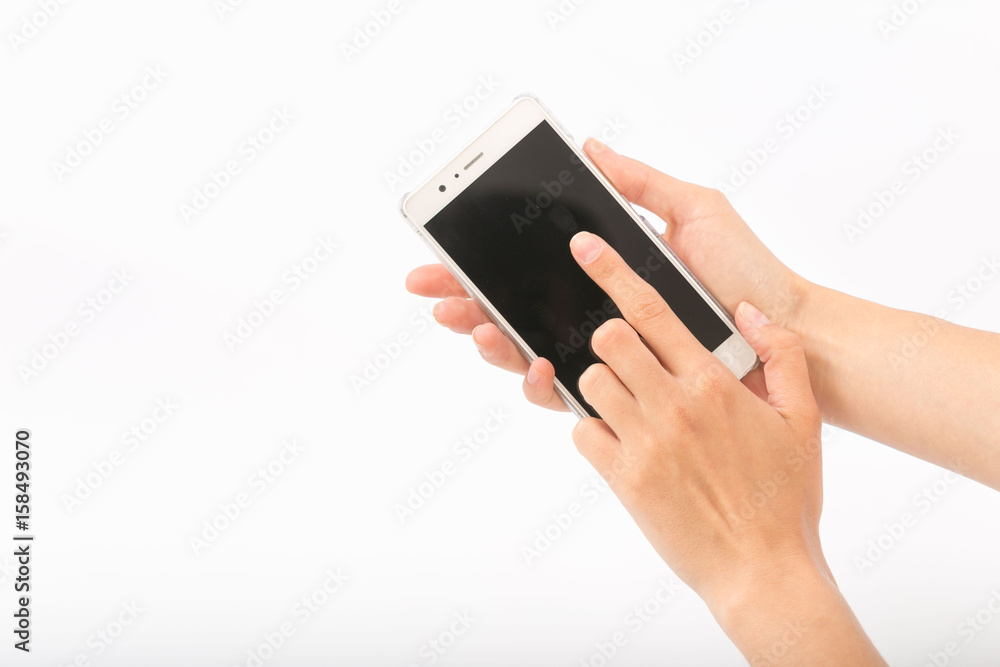 Female hands on a white background with a phone. Female hands on a white background with a phone.