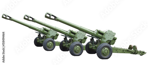 Three old green russian artillery field cannon gun isolated over white photo