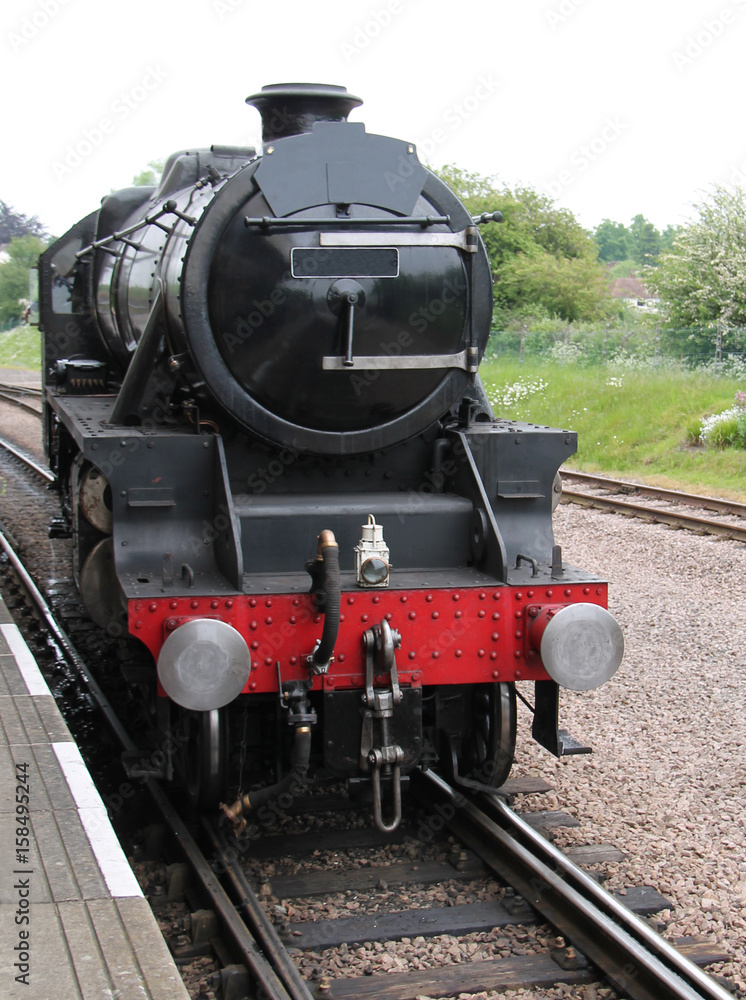 Naklejka premium A Powerful Railway Steam Locomotive Train Engine.