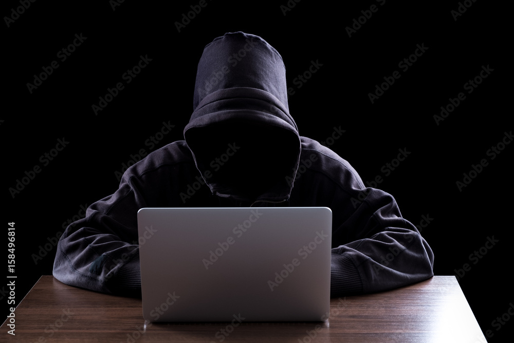Anonymous hacker in the dark Anonymous hacker in the dark
