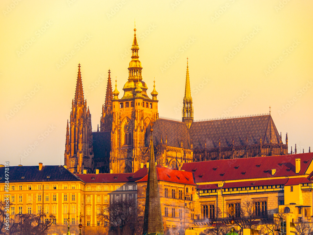 Towers of Saint Vitus Cathedral on Prague Castle illuminated by sun, Prague, Czech Republic.