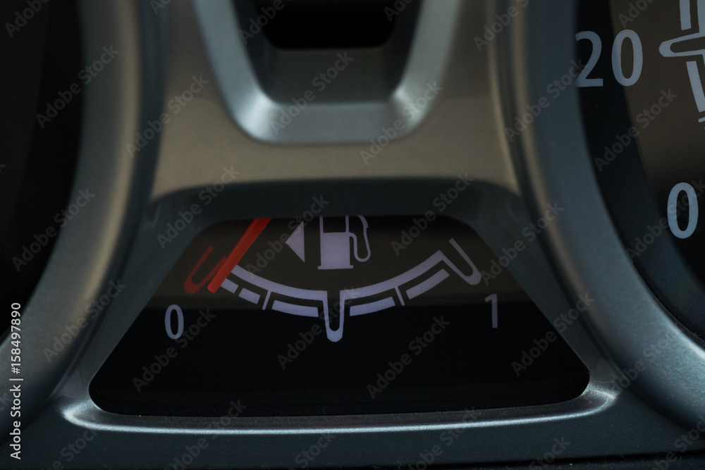 Set of car dash boards petrol meter, fuel gauge, on black background concept warning checking oil Set of car dash boards petrol meter, fuel gauge, on black background concept warning checking oil